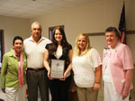Blair Logan Rauch, center, is the 2012 recipient of Metairie Woman's Club $2500 scholarship.  She is a senior at Chapelle High School and plans to study pre-veterinary medicine at LSU.  Pictured with Blair are, from left, Cindy Enright, MWC Scholarship Chairman; Brian and Tracy Rauch, Blair's parents, and Sue Rooney, president.
