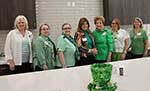 March hostesses Diane Curry, Melanie Rose, Linda Gallagher, Melinda Bourgeois, Janet Bryant, and Judy Wood