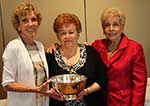 Awards Chairman Jerri Klein presents Outstanding Woman of the Year Award to Betty Ennicios with President Carrel Epling