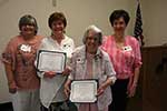 Beverly Bond and Iona Myers presented 25-year Certificates with President Cindy Garic and Linda Sharp, Membership Chairman