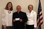 Community Service Chairman Judith McKey, Abbot Justin Brown, of Pennies for Bread, and Coleen Perilloux Landry, Grant Sponsor