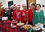 Hostesses Cindy Enright, Betty Exnicios, Mary Membreno, Joyce Burns, Beverly Bond, June Prados, Pat Hanemann, Virginia Cullens and Evelyn Smith