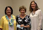 Fran Puig, sponsor of Ignatian Spirituality Project for Women, Susan Rodriguez of Ignatian and Judith McKey, community service chairman