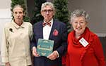 December speaker John Magill with Lynn Skidmore and President Beverly Randazzo