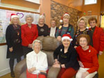 MWC Philanthropic Committee at Magnolia School & Hilda Knoff School, 2012.  Seated, Iona Myers, Melanie Rose and Agnes Jones.  Standing, Rubye Evans, Marion LaCoste, Linda Deichmann, Sydney Condon, Jerry Gast, Diane Breaux and Rita Clare Quartaro