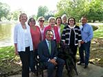 Coleen Landry, Cindy Garic, Irene Rogillio, Beverly Christina, Melanie Rose, Linda Deichmann, Linda Gallagher and Councilman Ben Zahn.  Seated is Parish President John Young