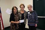 Metairie Woman's Club President Yvonne Perret, Speaker Dale Curry, Ginger Crawford