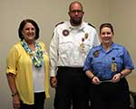 President Fran Puig, East Jefferson General Hospital EMS staff Shane Woodard and Christine Bass