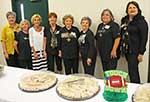 September hostesses from left Trisha Seal, Kathleen McGregor, Jerri Klein, Suzie Clemmensen, Elsie Manos, Marguerite Ricks, Cindy Garic, and Cheryl Faust