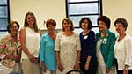 Sponsors Jane Livaudais and Beth Buchler, new member Heidi Burke, President Judy Wood, new member Melissa Monaghan with sponsor Evelyn Smith and Kit Lipps, membership chairman